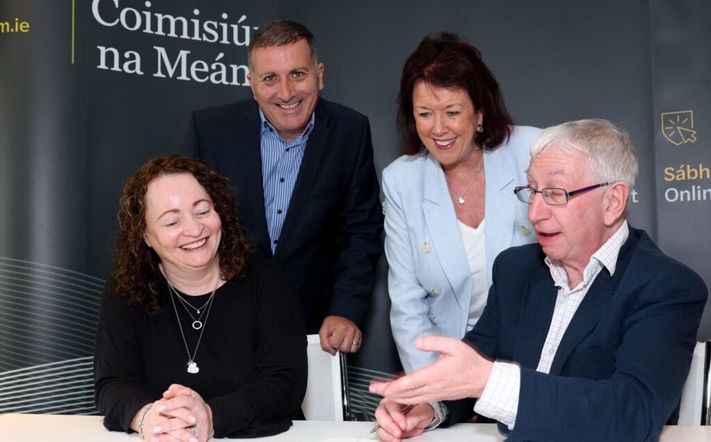 Caption: (L-R) Áine Ní Chaoindealbhain, Deputy Managing Director, Virgin Media Television, Paul Farrell, Managing Director, Virgin Media Television, with Celene Craig, Broadcasting Commissioner and Jeremy Godfrey, Executive Chairperson, Coimisiún na Meán, at the signing of a new national free-to-air Television Programme Service Contract with Virgin Media Television Limited. Coimisiún na Meán Head Office, Wednesday 26th July, 2023